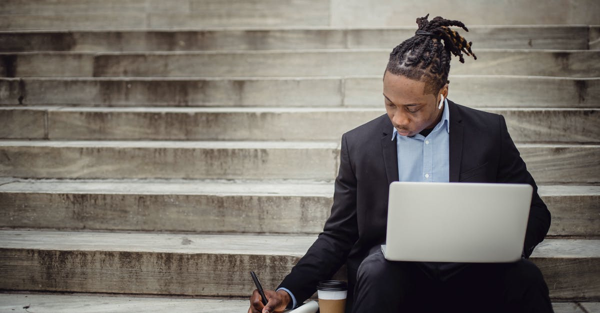 Is there something special going on with "I've" in regard of Data's inability to use contractions? - Concentrated young black man with dreadlocks in elegant suit browsing laptop and writing out information in notebook while sitting on stairs with takeaway coffee