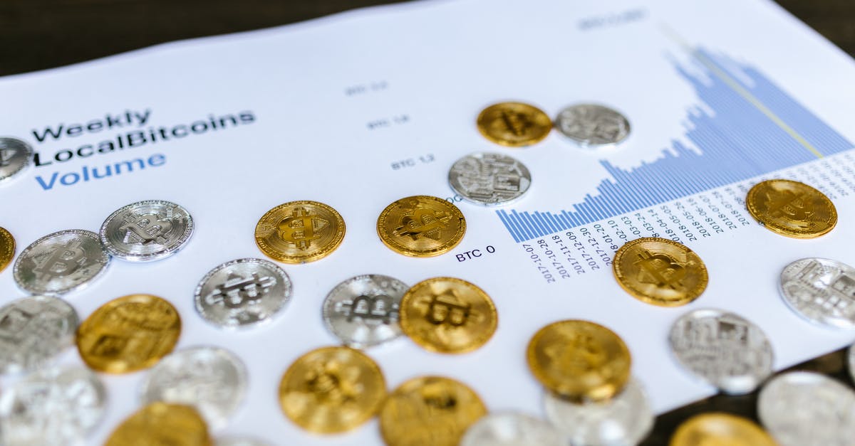 Is this an homage to Trading Places? - Gold Round Coins on White Paper