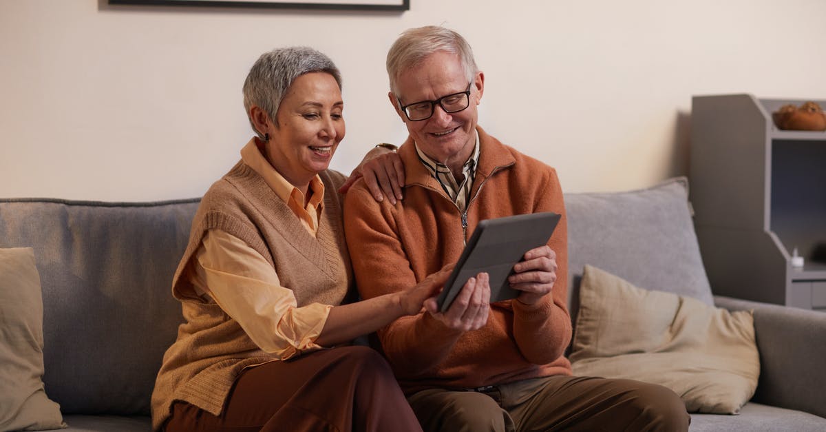 Is this the biggest age gap between romantic leads where the actress is the older? - Man and Woman Sitting on Sofa While Looking at a Tablet Computer