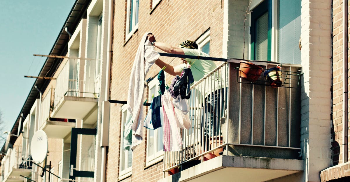 Knives out laundry scene logic - Low Angle View of Clothes Hanging on Balcony