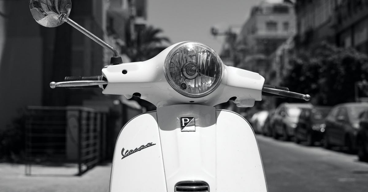 Last Crusade motorcycle [closed] - Grayscale Photo of a Vespa Lx Scooter