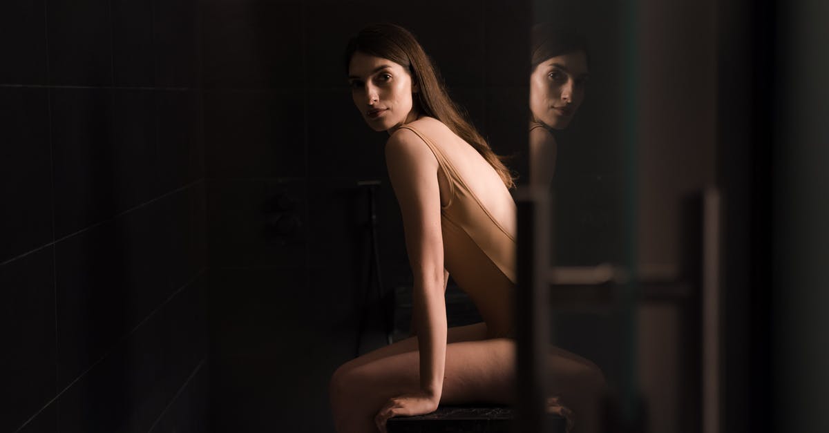 Meg sits in dark obsessing, reference? [duplicate] - Free stock photo of bathroom, body care, copy space