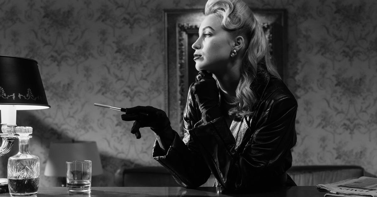 Movie where a woman tries to find the murderer of her brother? Dark setting, sort of redneck characters [closed] - Monochrome Photo of Woman Leaning on Counter Top