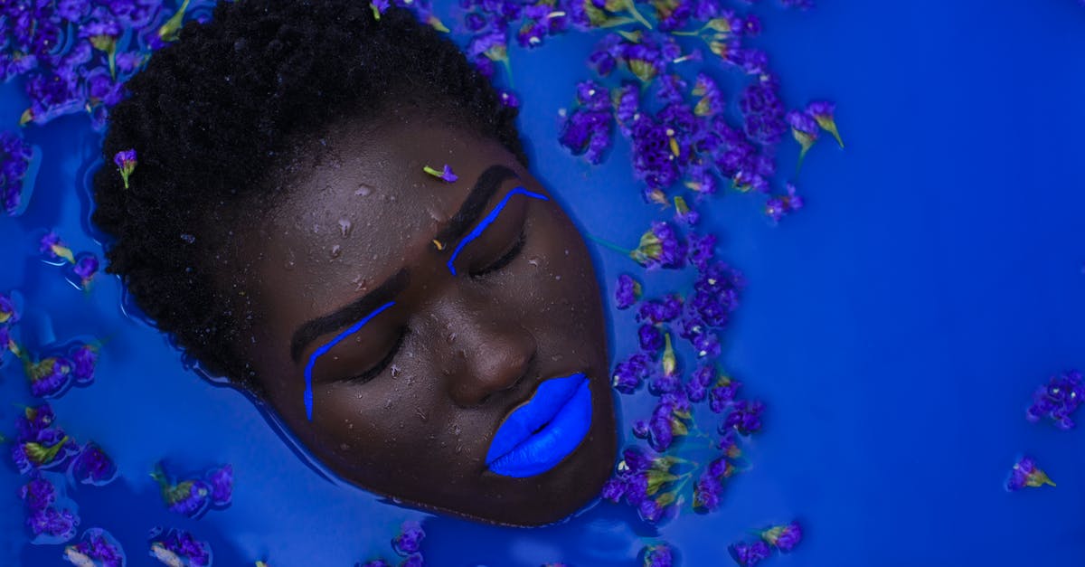 Movie where serial killer puts all the women he kills in the water like a "underwater garden" [closed] - Woman With Blue Lips on Body of Water