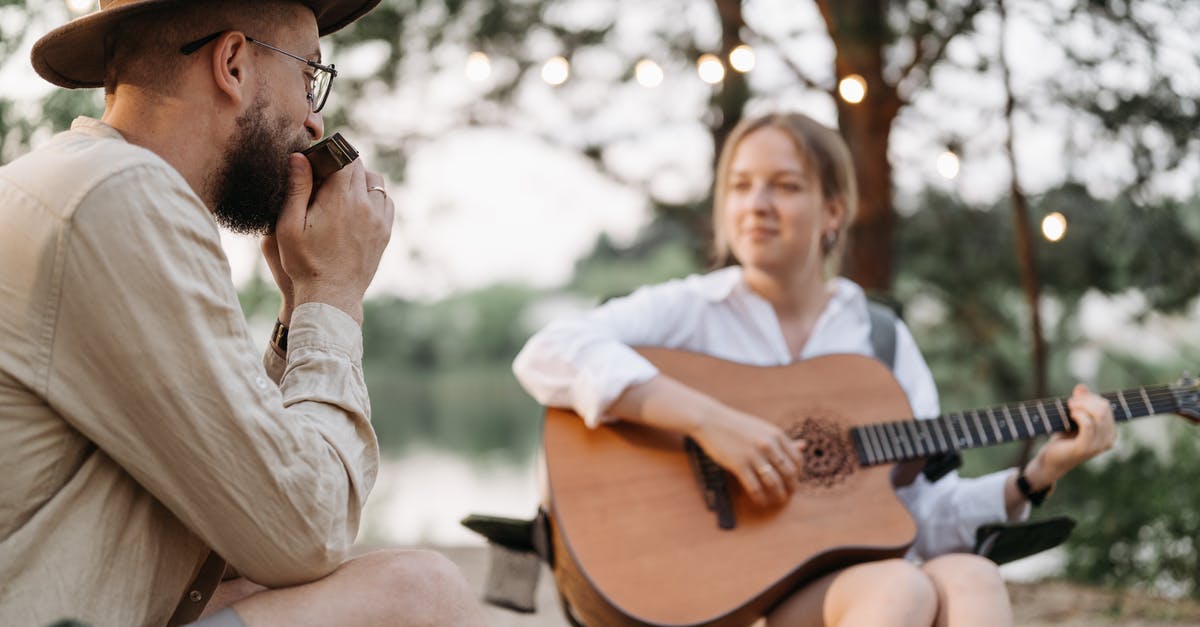 Nature of relationship between Jimmy and Kim - Free stock photo of acoustic guitar, adult, bonfire