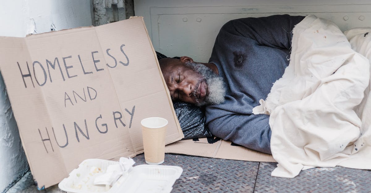 Now that Sons of Anarchy is over... What was up with that homeless lady? - Photo of a Homeless Man Sleeping Near a Cardboard Sign
