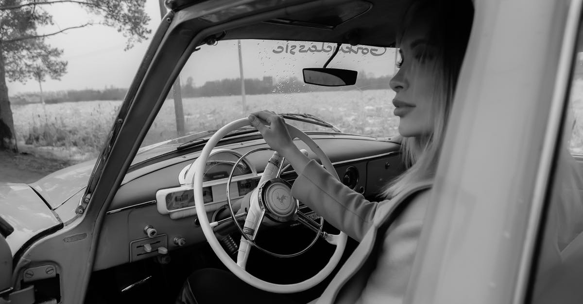 Old black-and-white political comedy about a young idealist running for Mayor [closed] - Black and white of thoughtful woman driving retro car in countryside and looking away in daytime