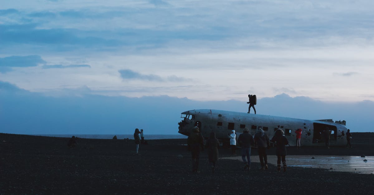 Plane crash survivors stuck on a creepy island [closed] - Person Standing on Vehicle