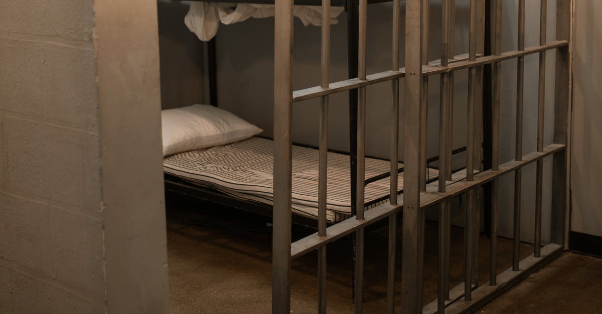 Prison cell doors in Gothika? - A Bunk Bed With Striped Linen Behind Bars