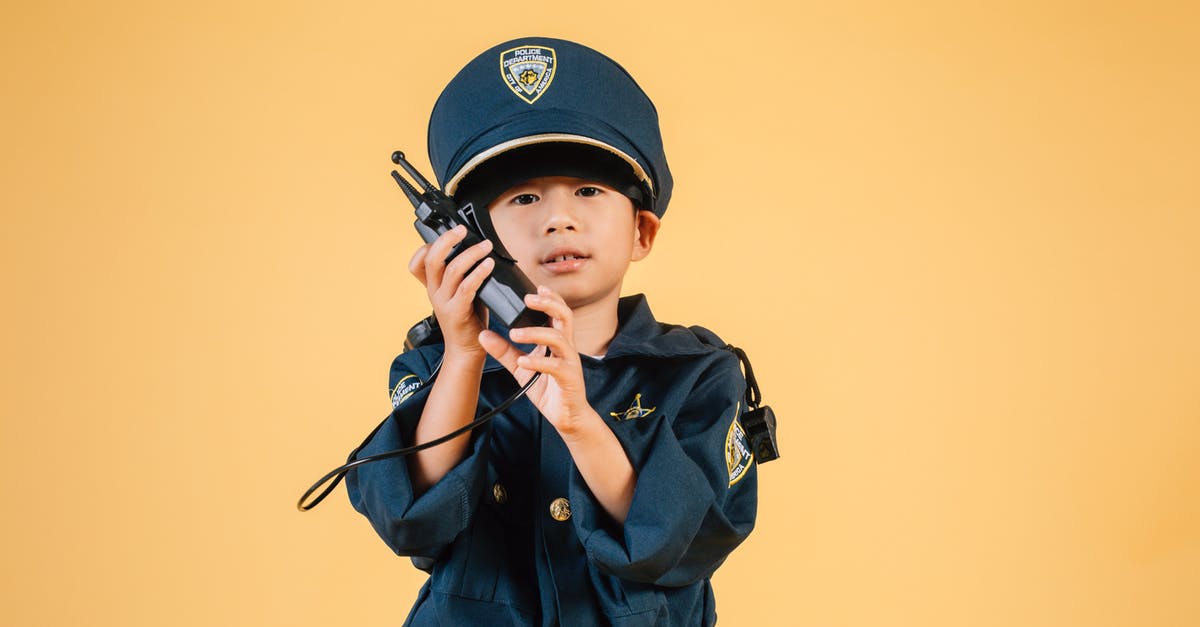 Purpose of Davos protecting Jon Snow? - Serious Asian kid in police uniform with transceiver