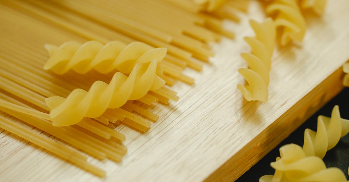 "Hacker" Type movie from the 80s/90s [closed] - From above closeup of fusilli and spaghetti placed on wooden board for cooking dish
