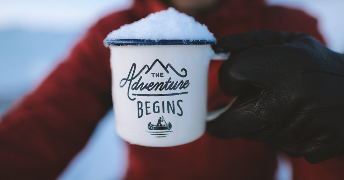 S07E17 of Adventure time, all food is alive. Why and what is a message? - Selective Focus Photography of Person Holding the Adventure Begins Mug