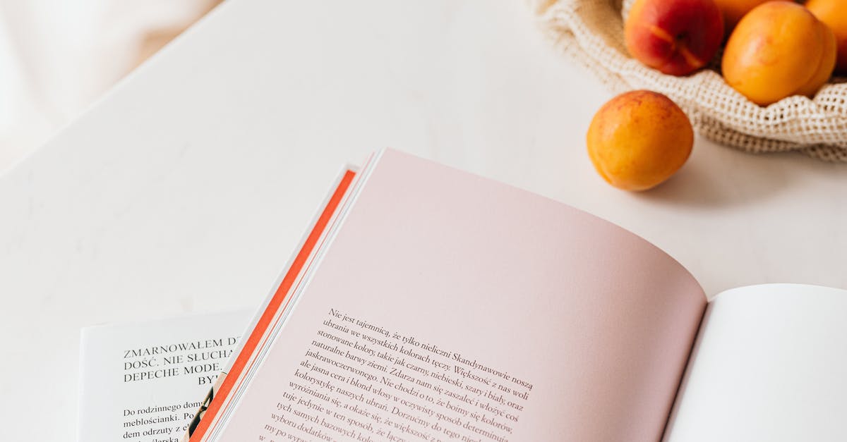 Santa Clarita Diet cancelled and open plots [closed] - From above of opened book placed on white table near cotton sack with natural ripe apricots