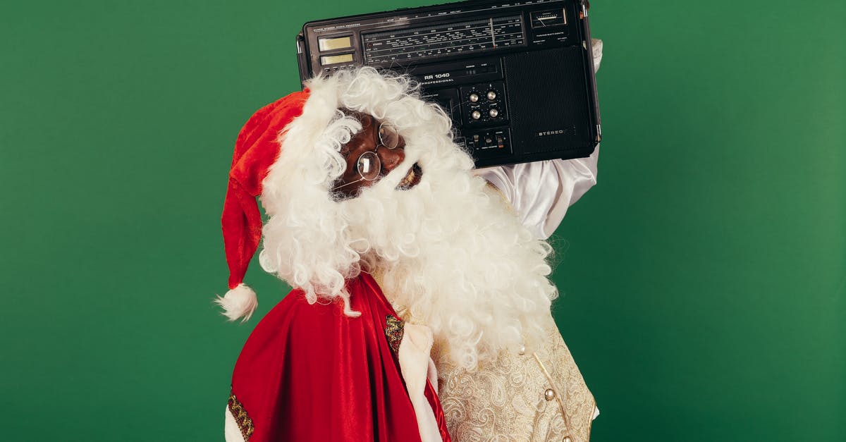 Scene where Steve Martin's character dances to music on the radio - Santa Claus Holding A Classic Radio