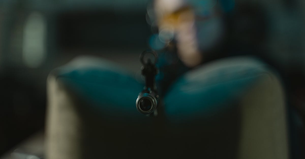 Significance of Joker's weapon circle in Suicide Squad? - Man in Blue and White Suit