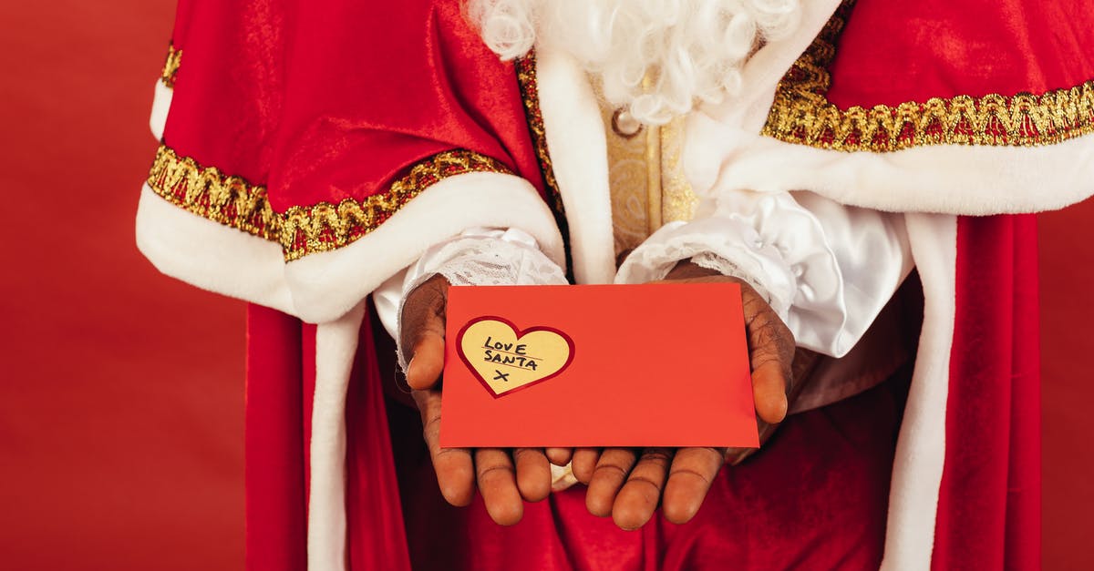 Significance of number 1239 in The Santa Clause - Person Wearing Santa Claus Outfit While Holding Christmas Letter