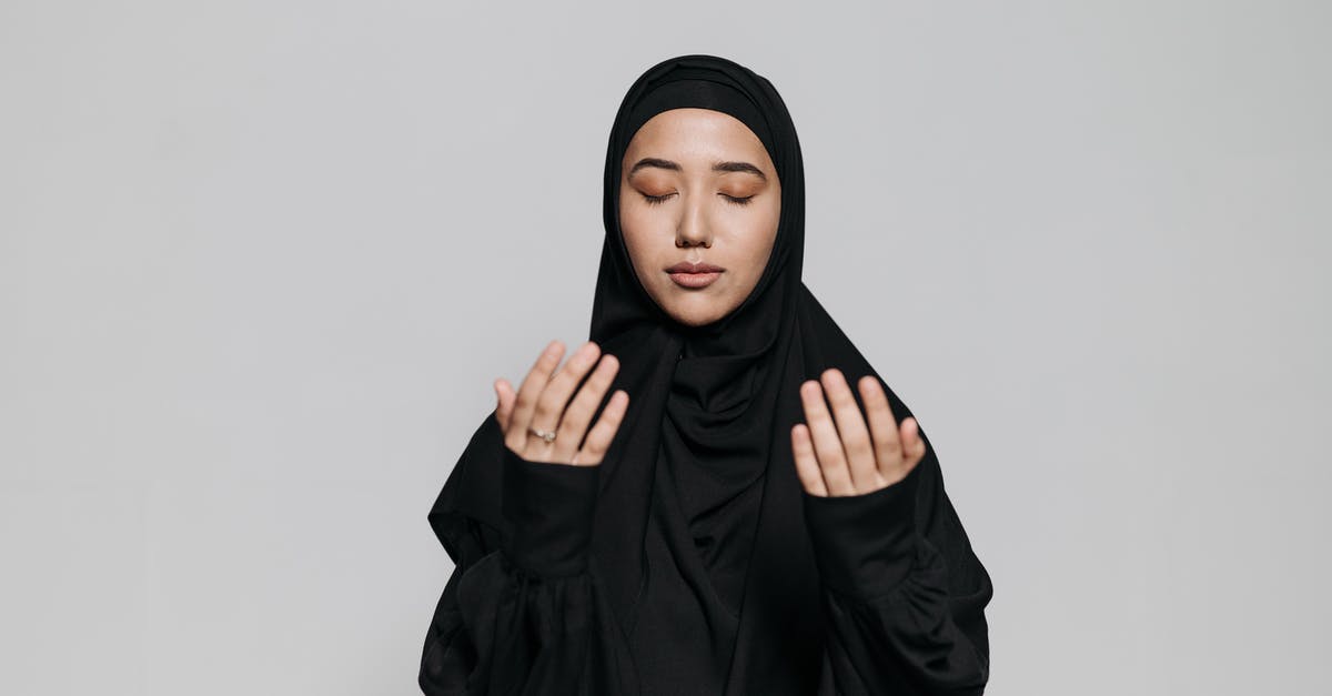 Soup, Courage or Faith? [closed] - Woman Wearing Black Hijab and Abaya Posing