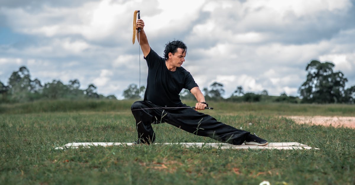 Swords in The Hobbit - Man in Black T-shirt and Black Pants Playing Golf