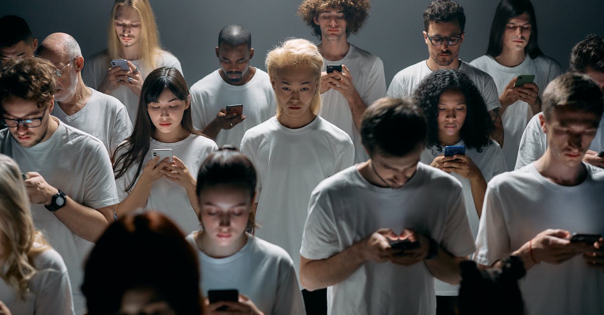 The future of "Almost Human"? - Group of People in White Shirts