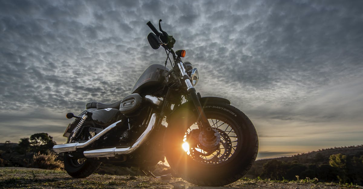 The hobbit, how is it possible that 48 FPS is better than 24 FPS - Low Angle Photo of Black Harley Davidson Forty-Eight 1200 Motorcycle Parked on Dirt Road During Golden Hour