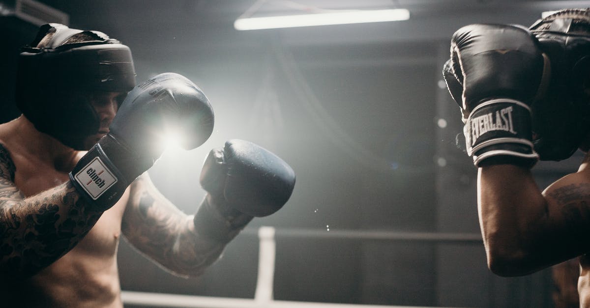Trope for nonlethal force being used in film fight scenes? - Man in Black Boxing Gloves