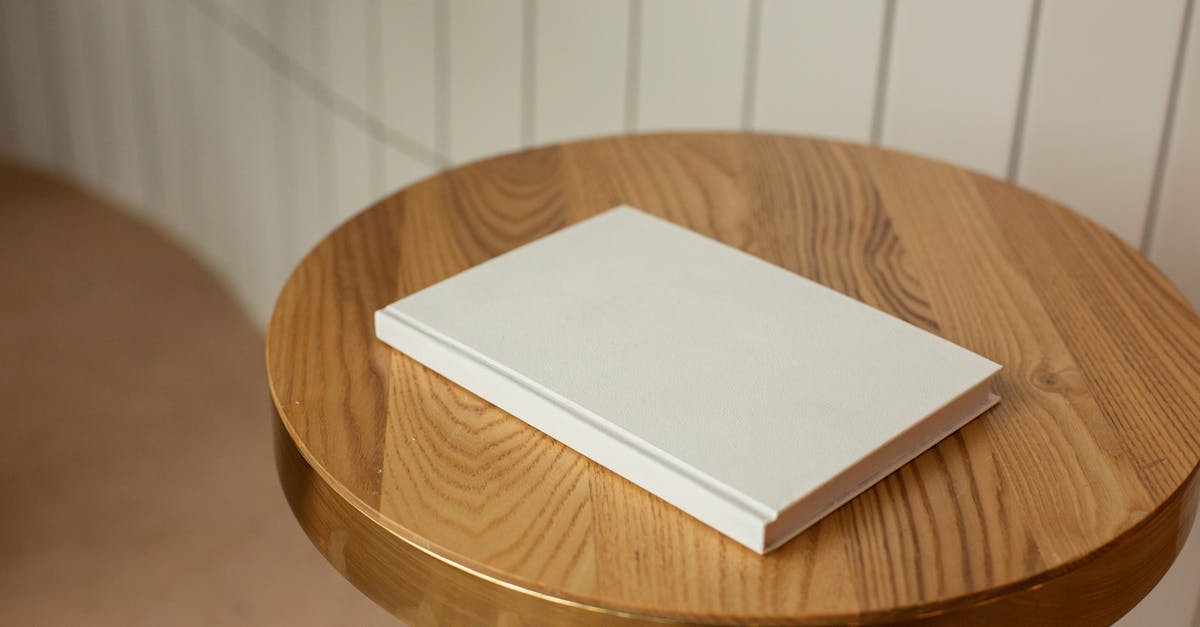 Truth in advertising; Fargo claims of being a true story [duplicate] - From above of round shaped wooden table with blank white book on blurred background