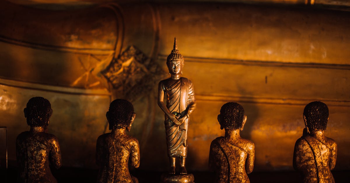 Trying to identify a martial arts movie, I thought it was called "The Golden Arrow" [closed] - Gold Buddha Figurine on Brown Wooden Table