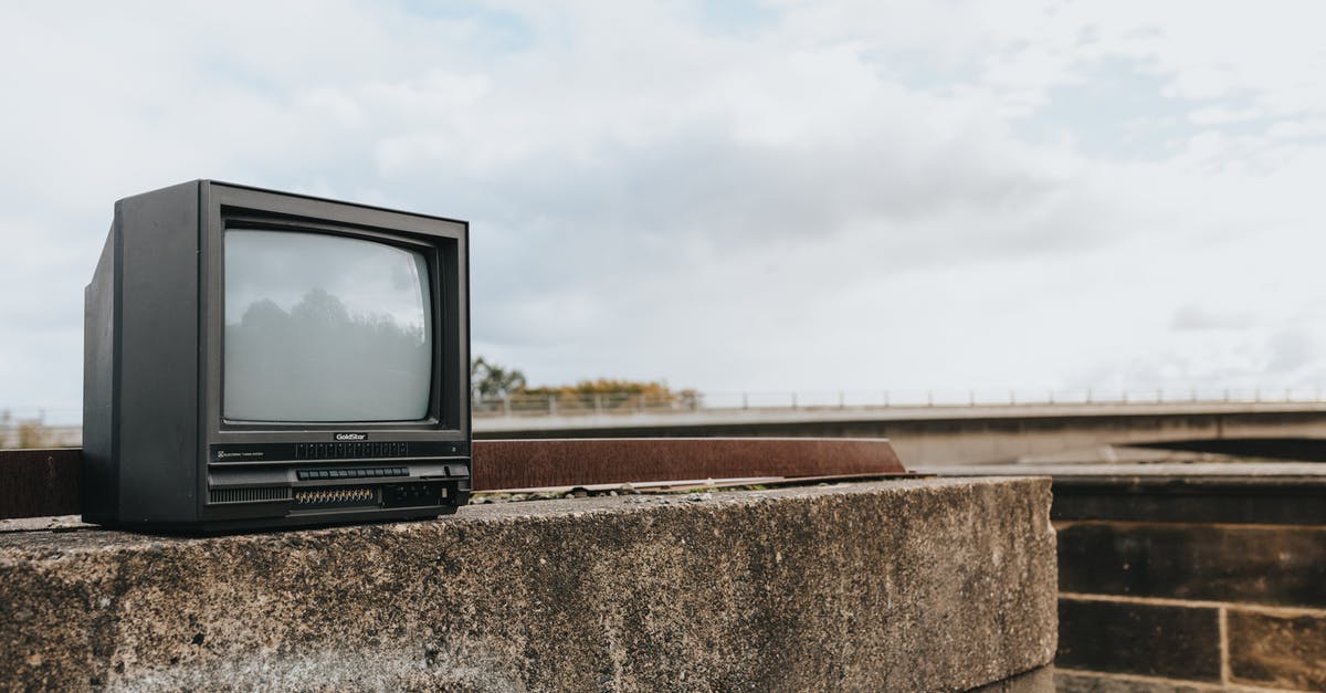 TV series about a suburban town digging up a space ship? [closed] - Retro TV set on stone surface
