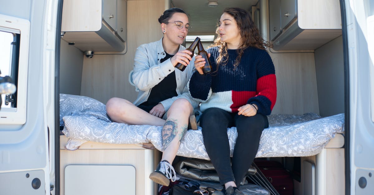 Valuables in Accountant's trailer drawer - Photo of Women Doing a Toast with Their Bottles of Beer
