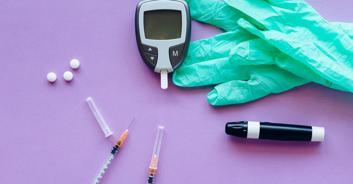 Vinnie Vega’s syringe kit - injectionBlack and White Click Pen Beside Pink Textile