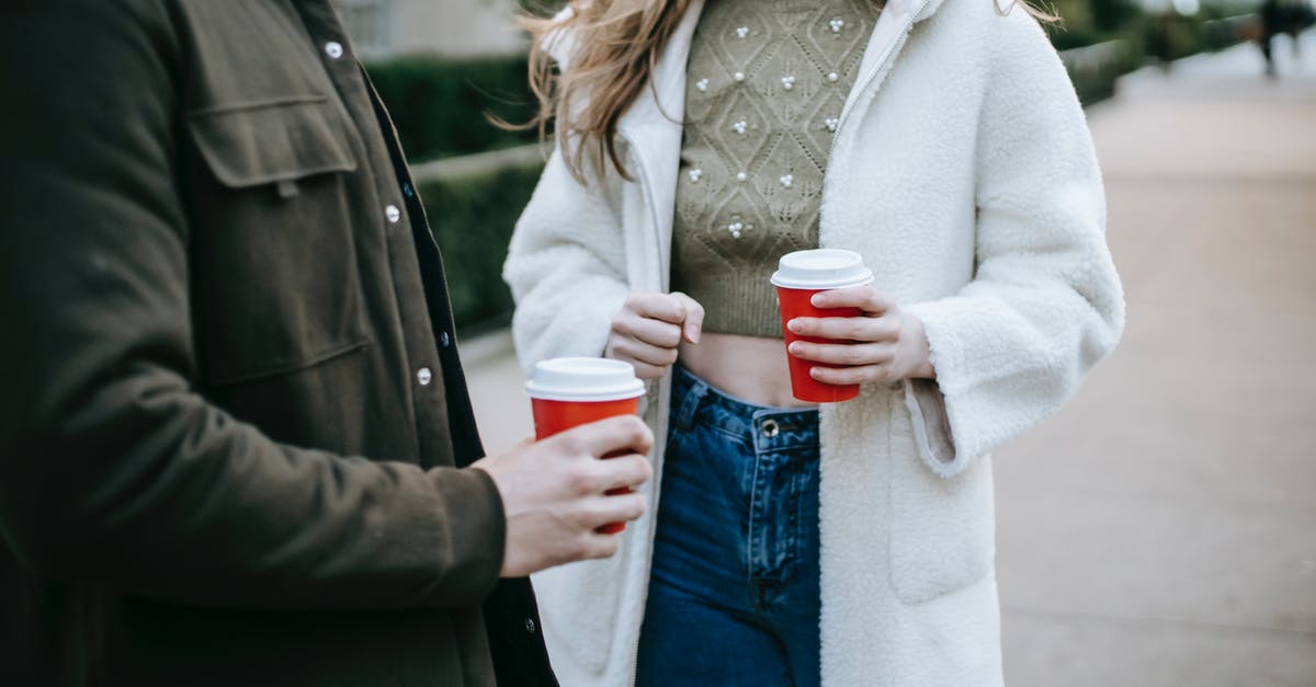 Was Amy going to get married before meeting Sheldon? [closed] - Anonymous stylish couple drinking takeaway coffee on street