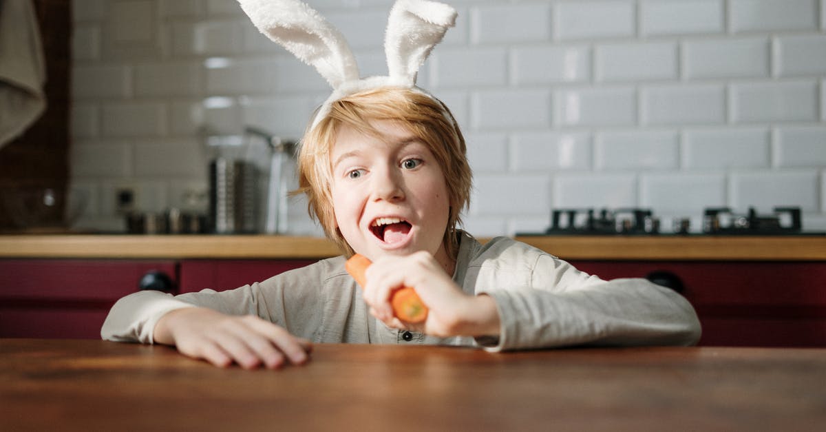Was Bugs Bunny impersonating someone when he ate the carrot? - Boy with Bunny Ears Eating Carrot