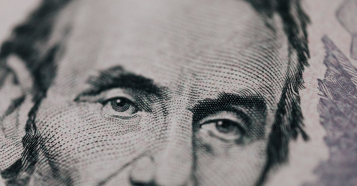 Was it that easy to become a vice President at Dunder Mifflin? - Closeup of male American president printed on five dollar bill and looking away pensively