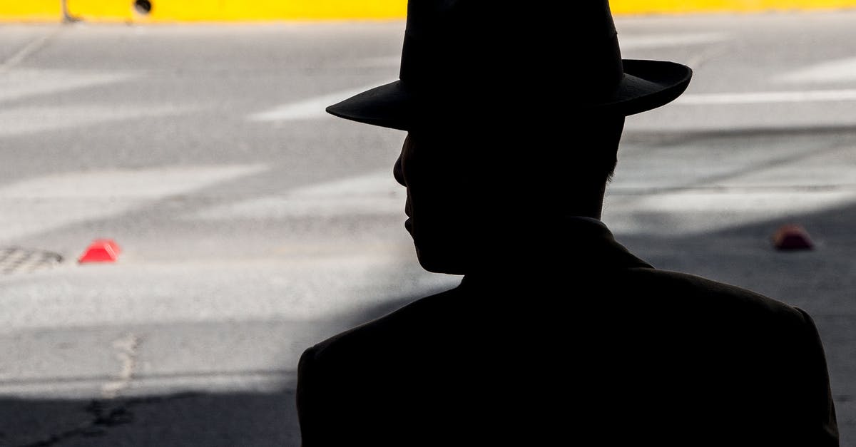 Was it that easy to fake identities back in the 1950s? - Silhouette of a Man in a Hat