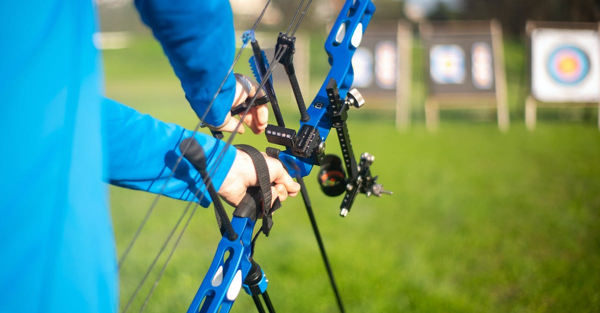 Was "Big Lob" originally supposed to be a licensed sports personality? - A Person Using a Compound Bow