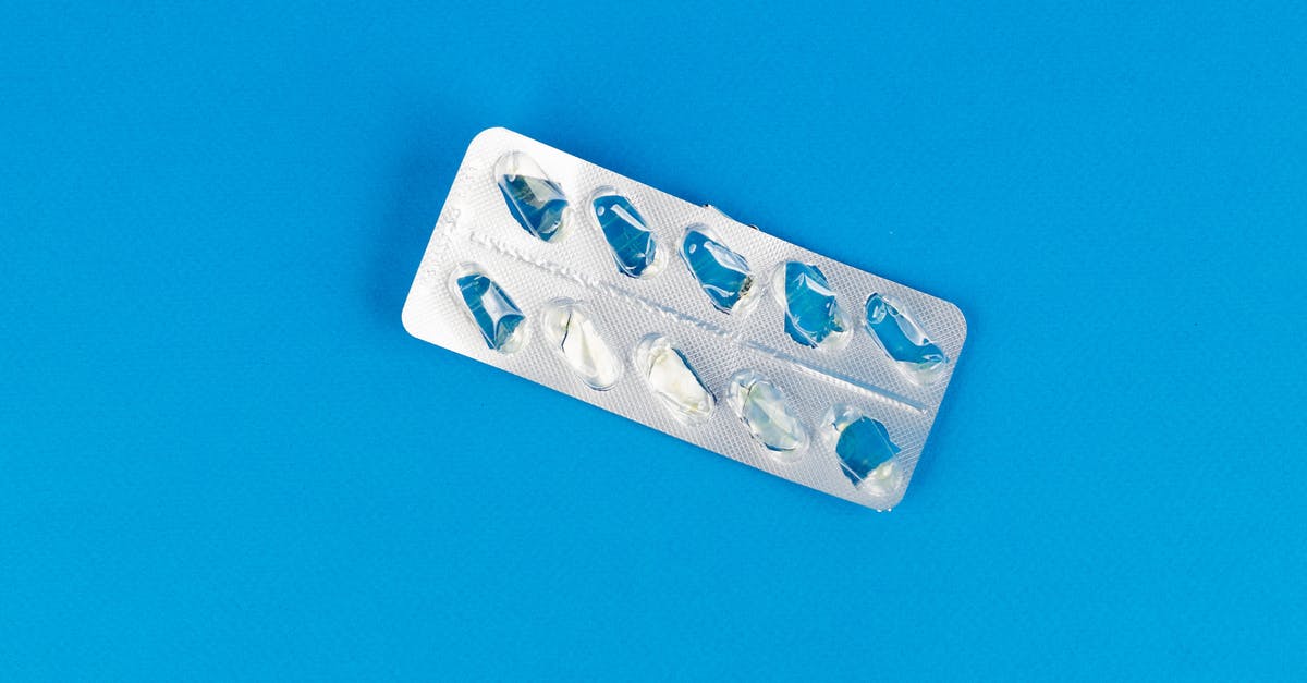 Was the medicine at the end acid? - Silver Blister Pack on Blue Surface