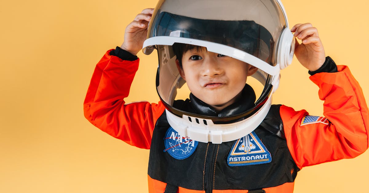 Was there an orange in “Elephant’s Dream”? - Positive Asian kid wearing cosmonaut helmet