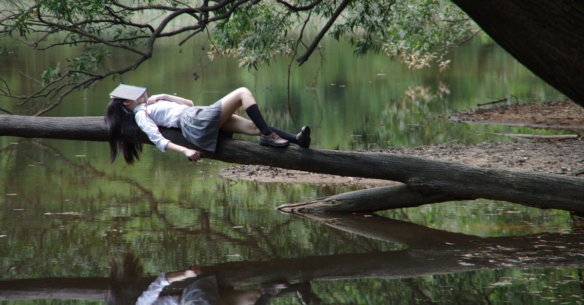 Watching Stewie sleep and rubbing knife against face reference? - Woman Lying on Tree Near Awter