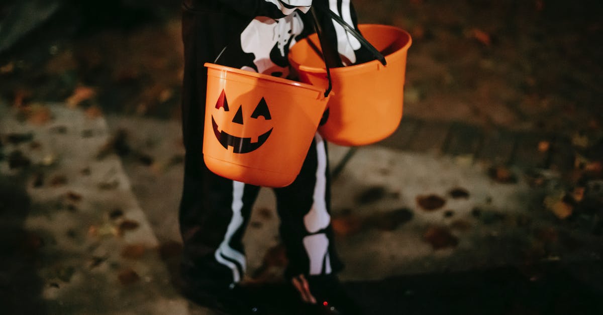 Were the events of the Evil Dead movies cancelled out by the events of Ash vs Evil Dead? - Unrecognizable kid with Halloween buckets on pavement at night
