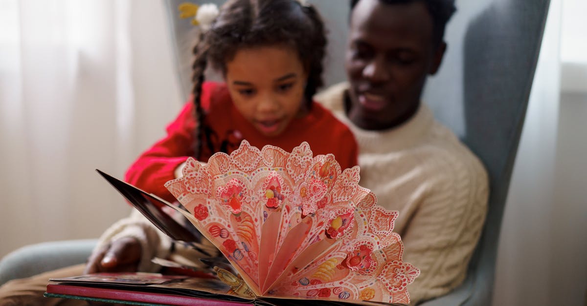 What's on page 47? - Dad and Daughter Reading a Cutouts Fairy Tale Book
