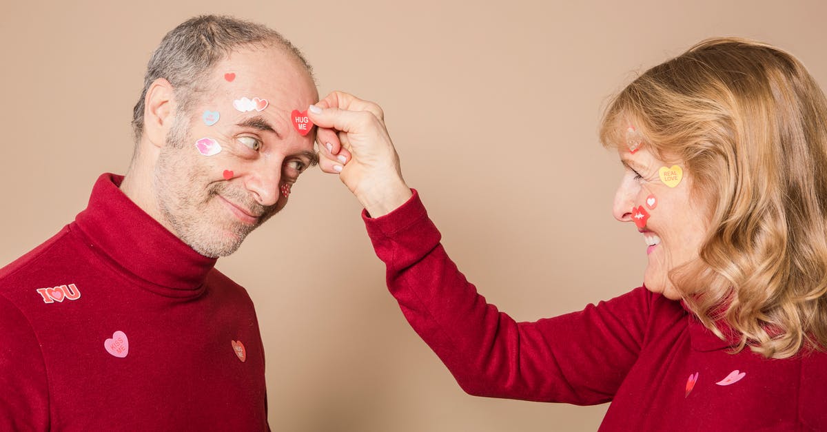 What's so funny about Ann's reply? - Woman Putting Stickers on Man's Face