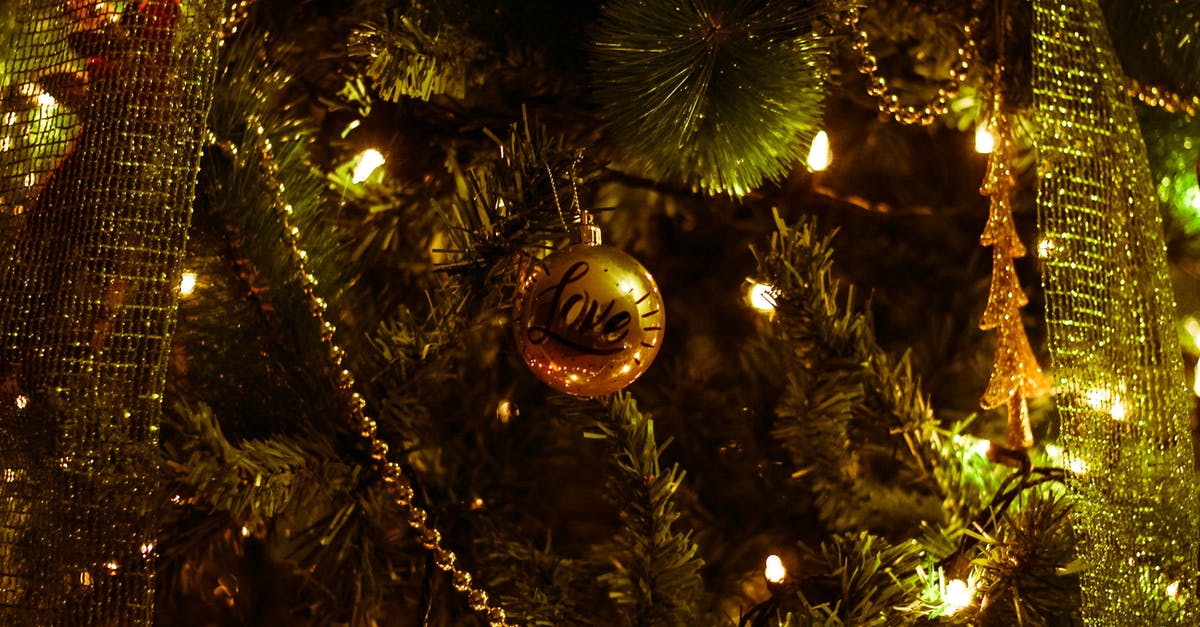 What's that movie with a surreal golden tree appearing from time to time? [closed] - Shallow Photography of Christmas Decor