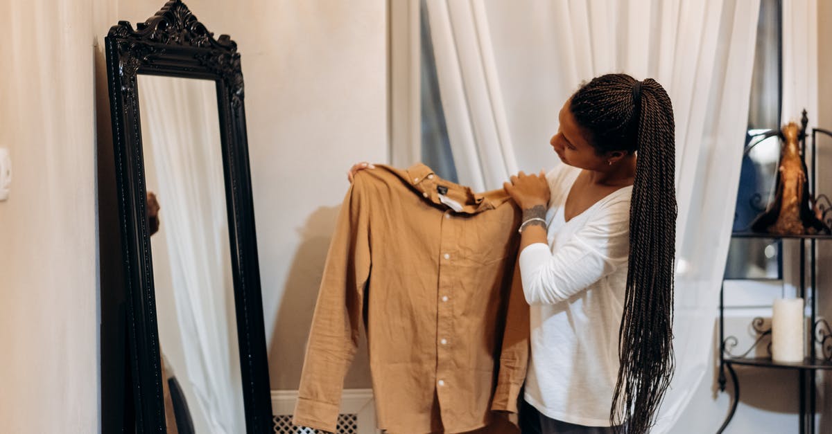 What's the Last Item on Shadows Shopping List? - A Woman Checking a Brown Long Sleeves Shirt