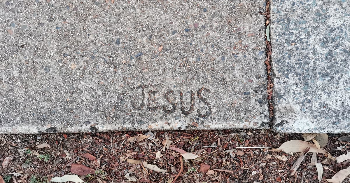 What's the name of this shot? - Jesus' Name Engraved On Concrete Surface