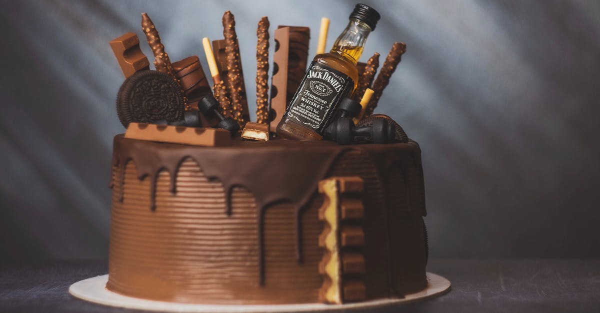 What's the story behind the 1980s no-name brand? [closed] - A Small Bottle of Jack Daniel's on a Chocolate Cake