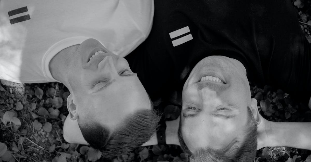 What's this movie about a ship getting upside down? [closed] - Smiling Men Lying Together on Grass