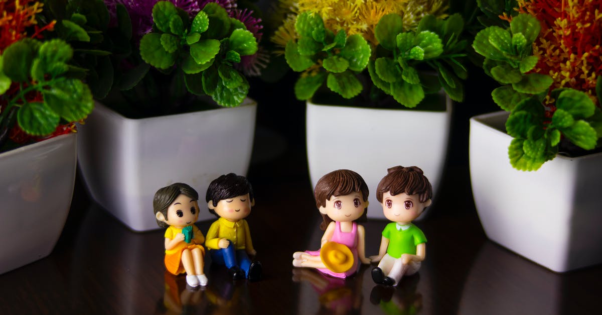 What are the double set triggers for? - Couples of figurines on table near flowerpots