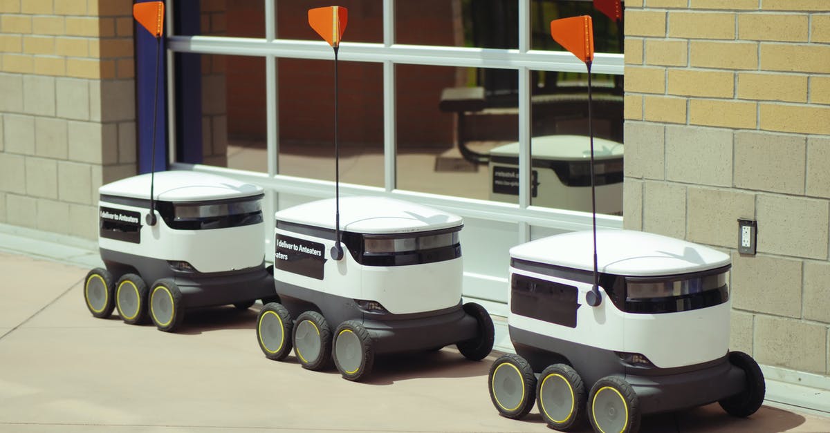 What are the implications of Emmet's autonomous movement? - Delivery Robots Parked Beside Glass Window