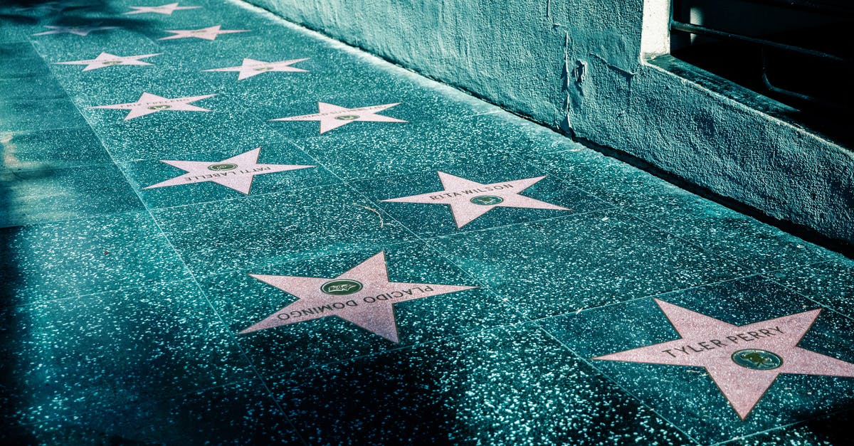 What are the names of the 17 Titans? - Pink Stars on Gray Tiled Street Sidewalk 