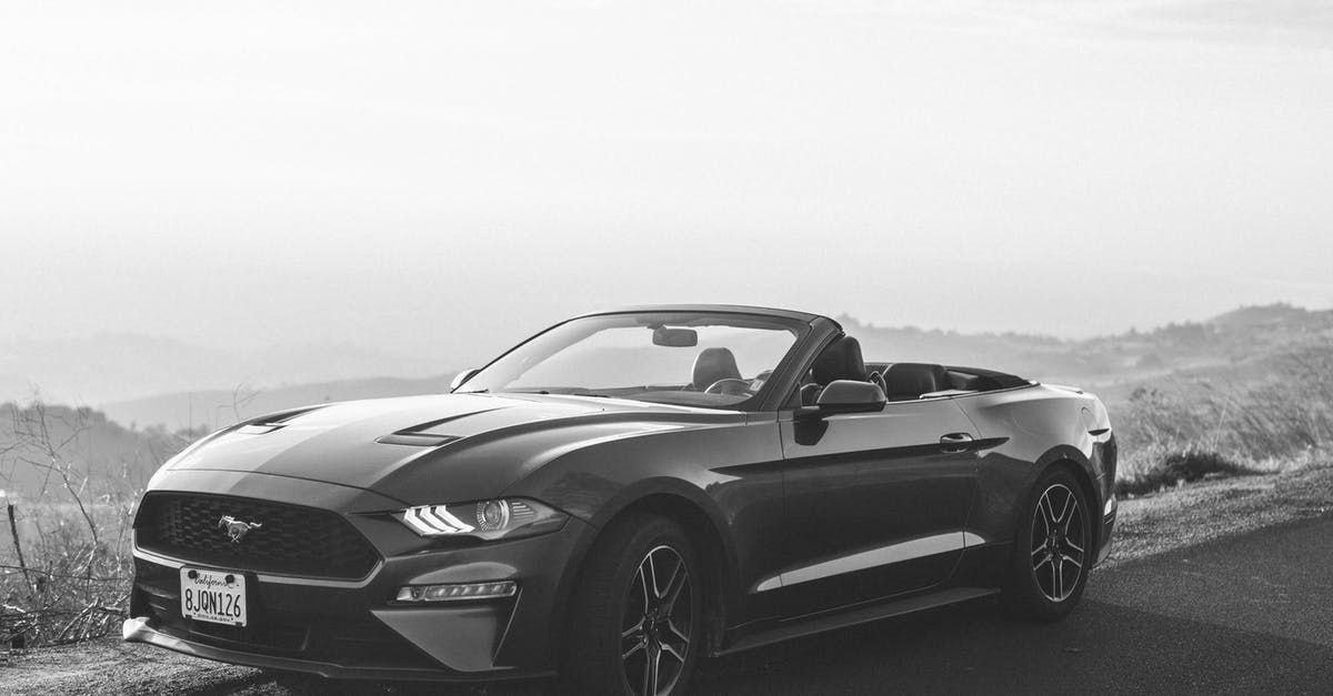 What became of John Wick's Ford Mustang? - Grayscale Photo of Mercedes Benz Convertible Coupe
